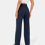 Navy blue wide-leg pants with elastic waist, front button placket, and two front pockets