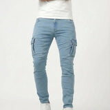 Light blue elastic cargo jeans with side cargo pockets and ankle cuffs