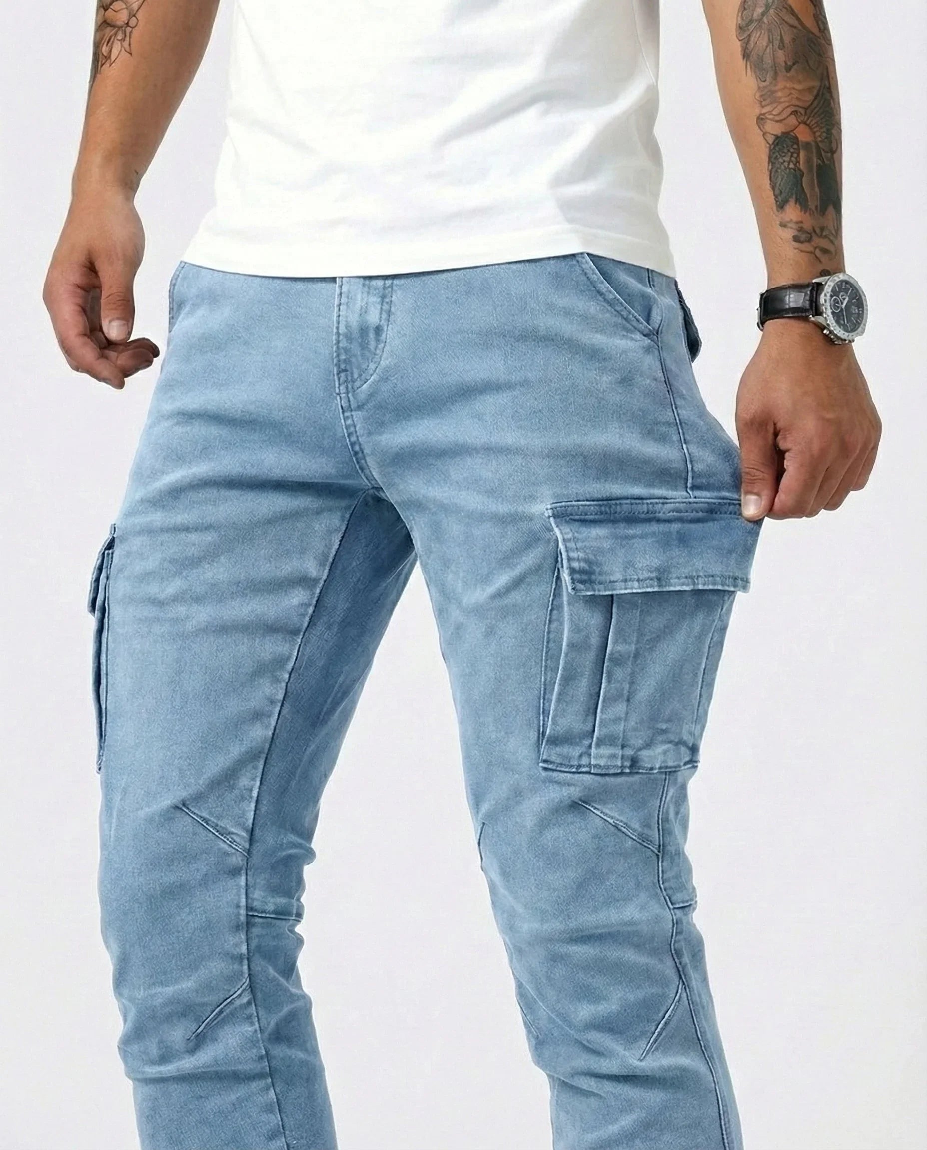 Light blue elastic cargo jeans with front cargo flap pockets and seam details