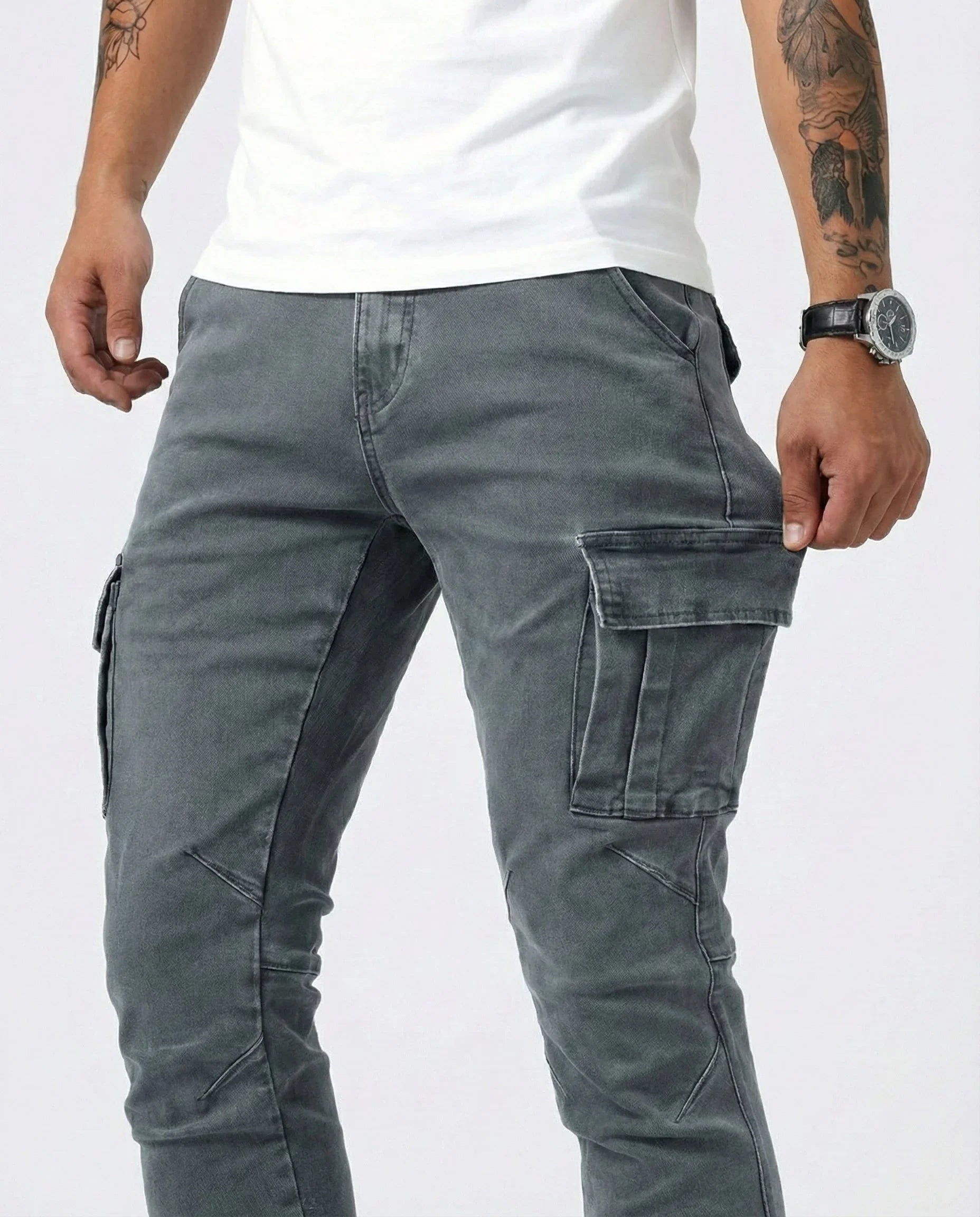 Gray elastic cargo jeans with front cargo flap pockets and stitched panels