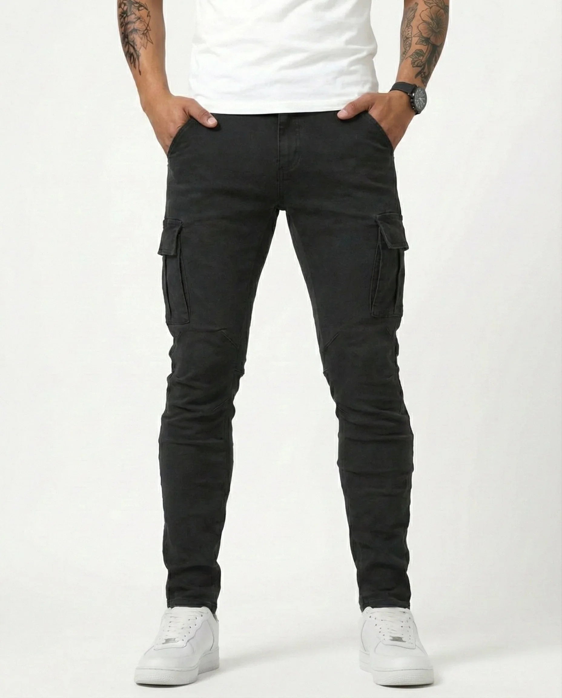 Black elastic cargo pants with thigh pockets, tapered legs, and ankle cuffs