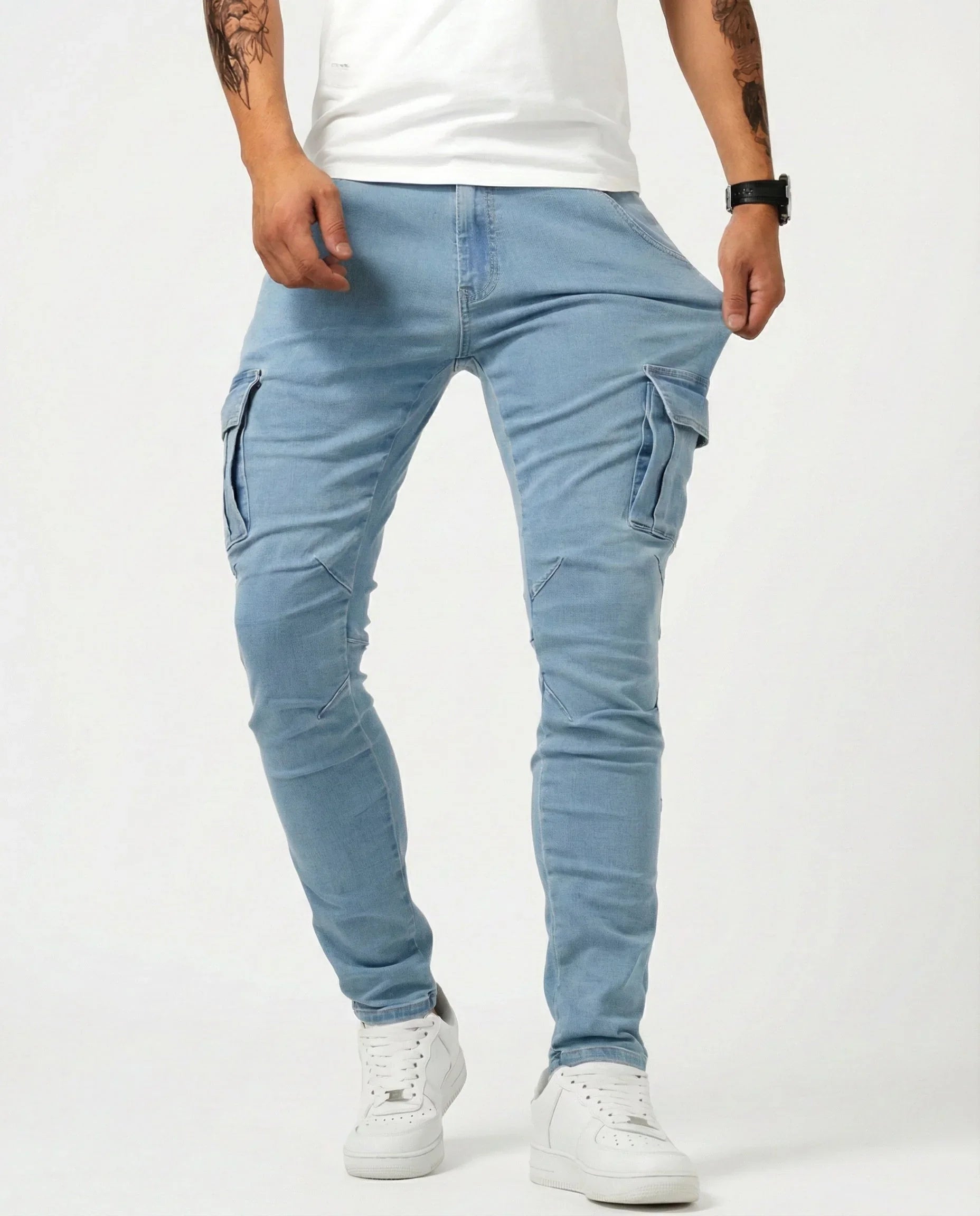 Light blue elastic cargo pants with side thigh pockets, tapered legs, ankle cuffs