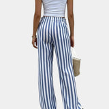 Blue-and-white vertical striped pants with elastic waistband and wide legs