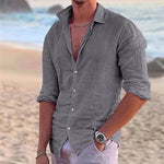 Men's casual button-up shirt, heather gray, slightly wrinkled, open collar.