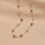Gold gem necklace with multicolor bead stones, long strand view