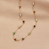 Gold gem necklace with multicolor bead stones, long strand view