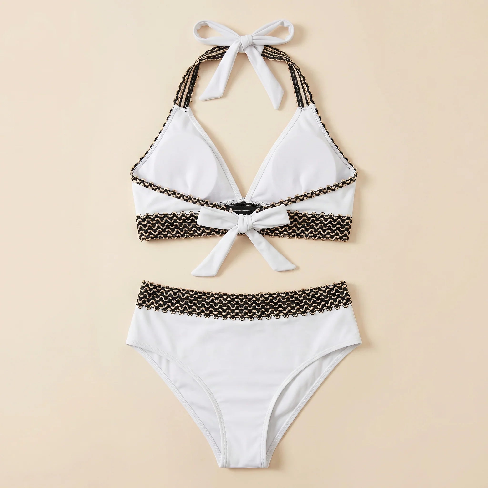White triangle bikini set with crocheted zigzag trim and halter tie, high-waist briefs