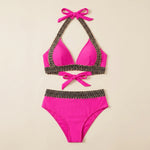 Pink triangle bikini set with crocheted zigzag trim and halter tie, high-waist bottoms