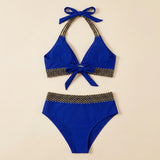 Navy blue triangle bikini set with crocheted zigzag trim and halter bow ties, briefs