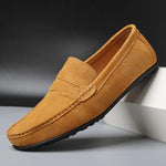 Brown suede loafers with slip-on strap and stitched moc toe detail