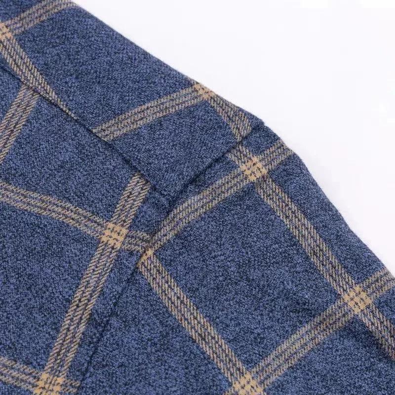 Navy checkered dress shirt fabric with tan grid pattern, front panel close-up.