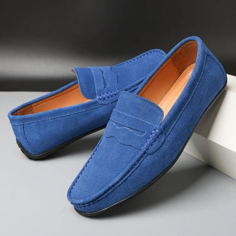 Sky blue suede loafers with slip-on strap and stitched moc detail