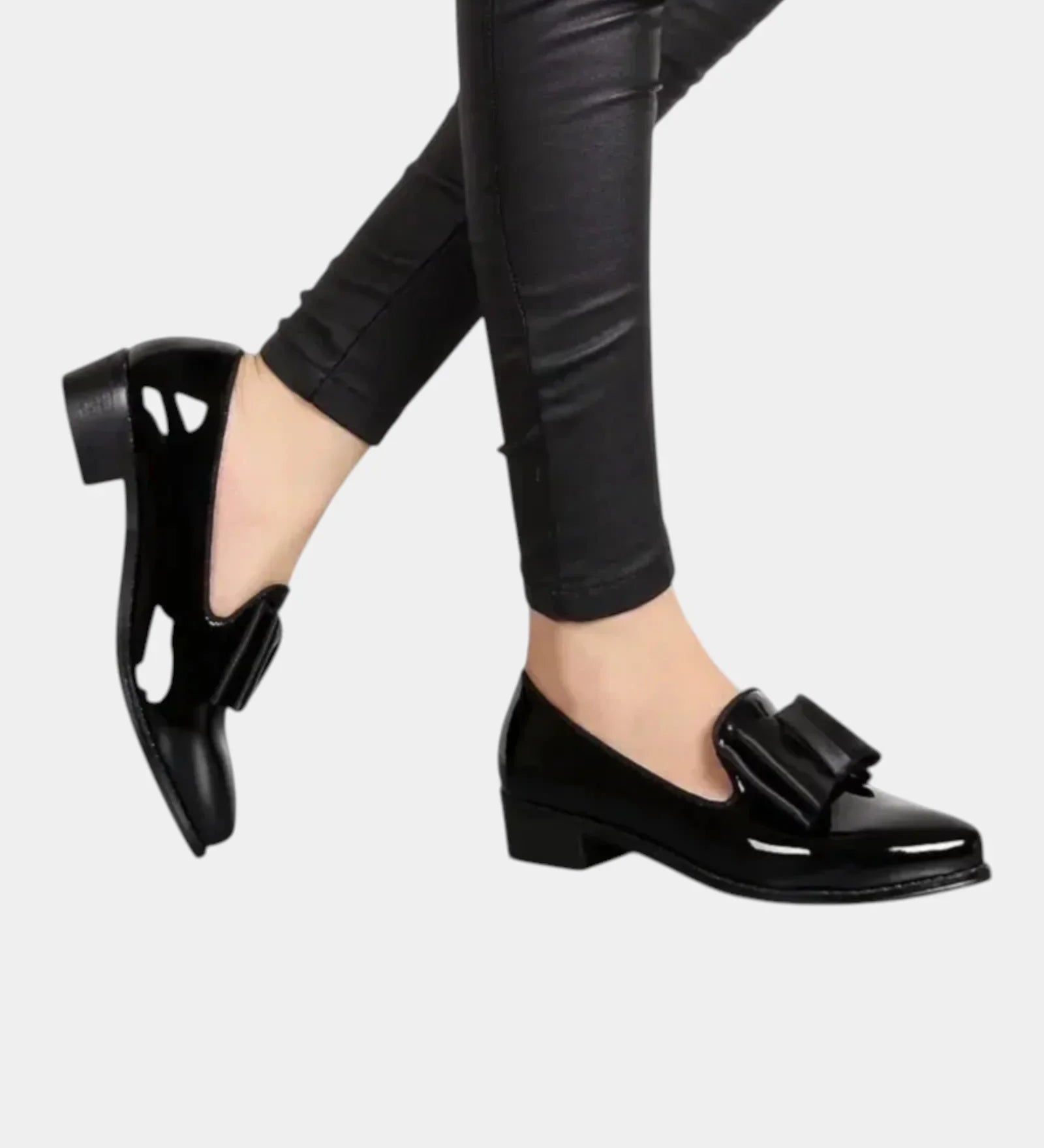 Black slip-on loafers with buckle strap and block heel