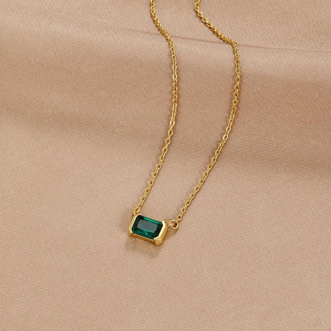 Gold-plated necklace with green emerald square pendant on a thin chain