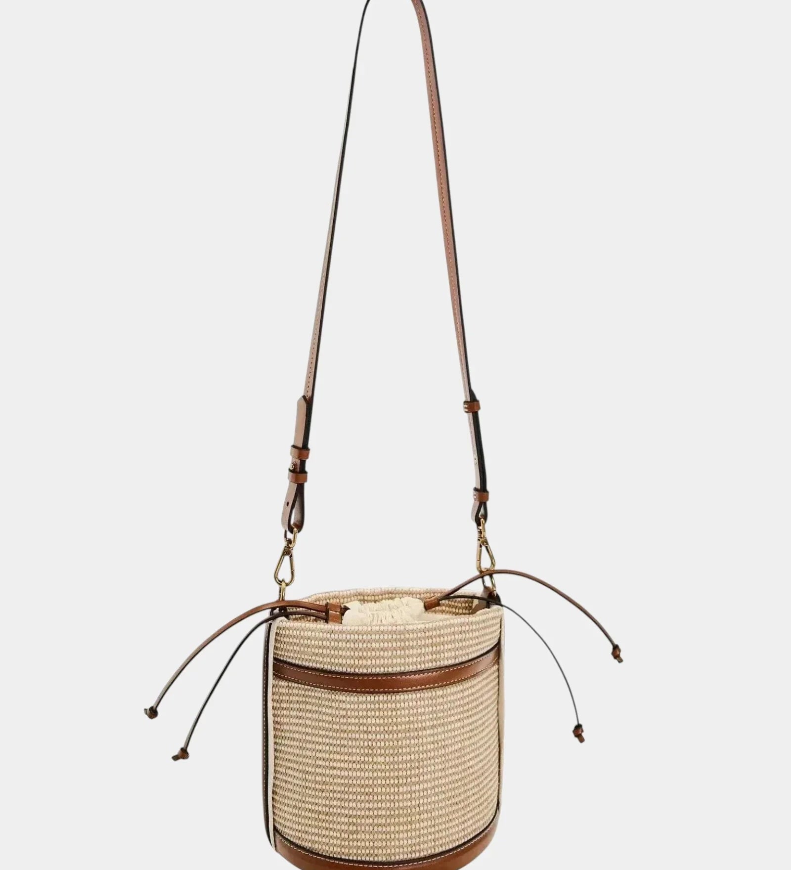 Brown knitted cylinder bucket bag with braided straps and leather trim