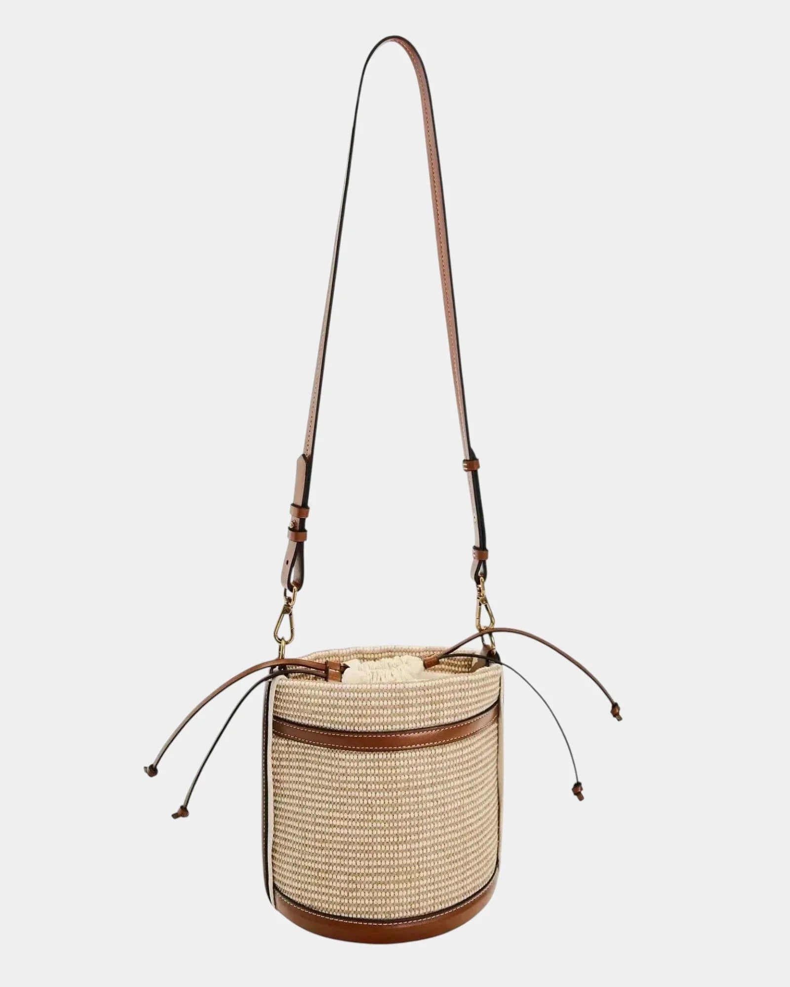 Brown knitted cylinder bucket bag with braided straps and leather trim