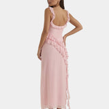 Light pink sleeveless long dress with ruffle details and layered side slit hem
