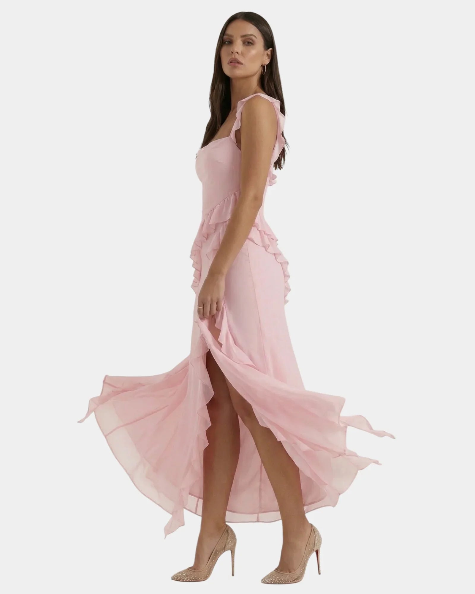 Light pink long dress with ruffled side layers and flowing skirt, sleeveless