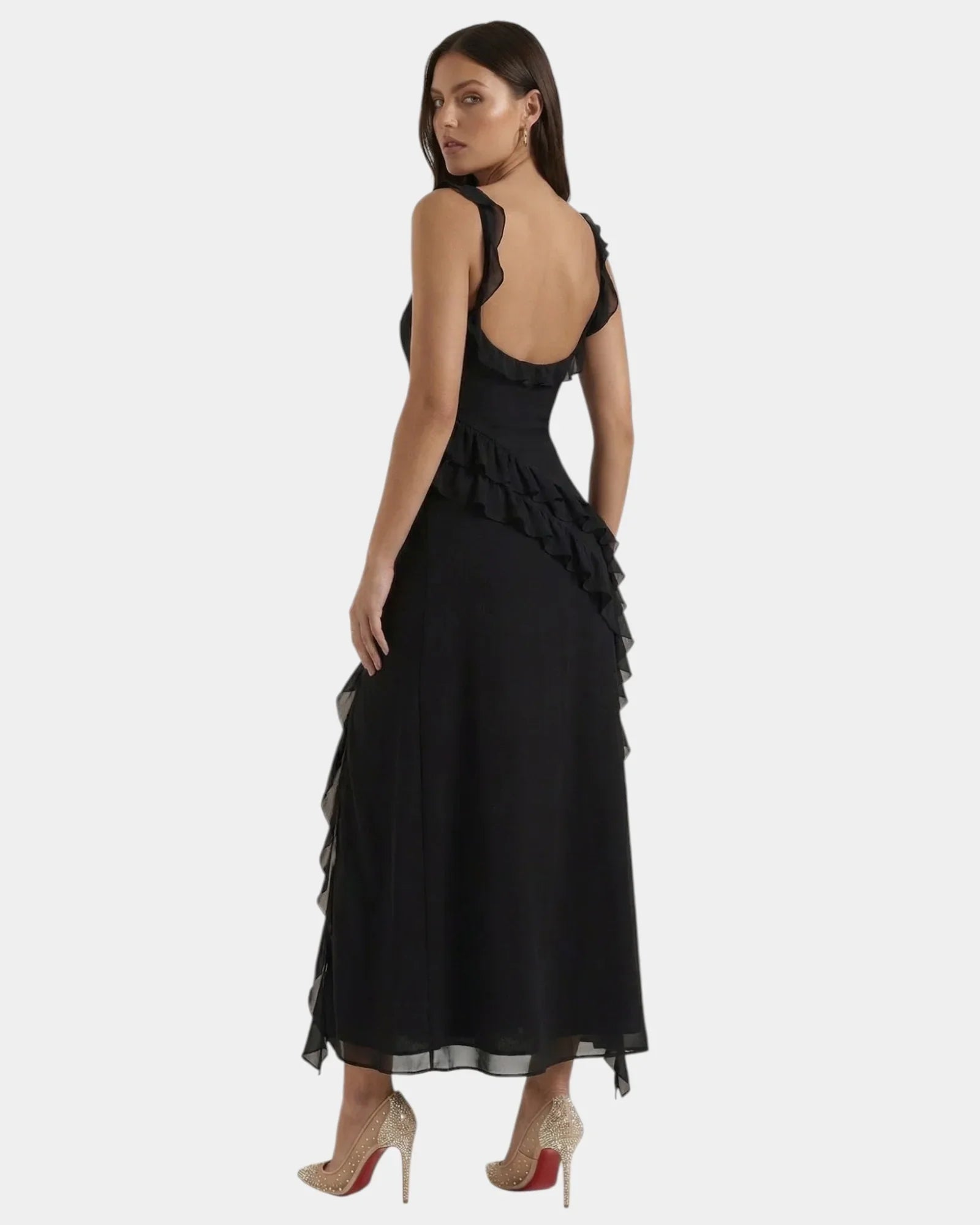 Black sleeveless long dress with ruched ruffle details and layered side slit hem