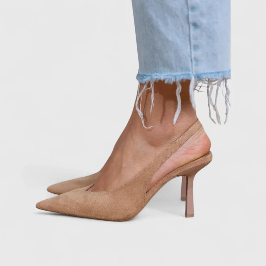 Beige pointed-toe heeled bootie with low block heel and backless collar