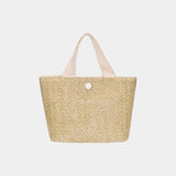 Knitted tote bag with light pink handles and white button front, beige woven texture