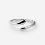 Silver open band ring with smooth twisted design and dark center insert