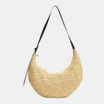 Woven hobo style shoulder bag in light beige with long handles and suede-like straps