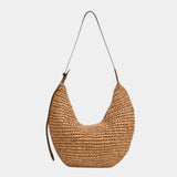 Woven hobo style shoulder bag in dark tan with long handles and suede-like straps