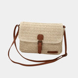 Beige knit crossbody bag with flap and brown leather accents, shoulder strap