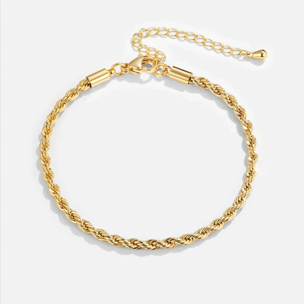 Gold chain bracelet with braided centerpiece and secure clasp
