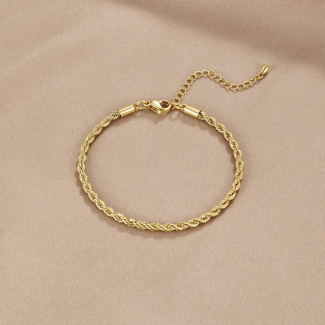 Gold braided chain bracelet with clasp and short extender loop