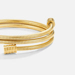 Gold coiled multi-strand bracelet with ribbed texture and clasp