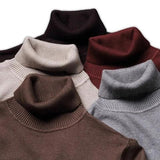 Assorted color turtleneck collars of sweaters, ribbed knit, folded for display