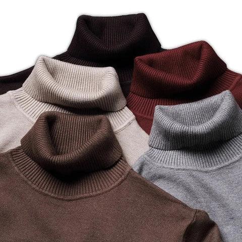 Assorted color turtleneck collars of sweaters, ribbed knit, folded for display