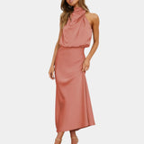 Pink halter-neck draped satin midi dress with side slit