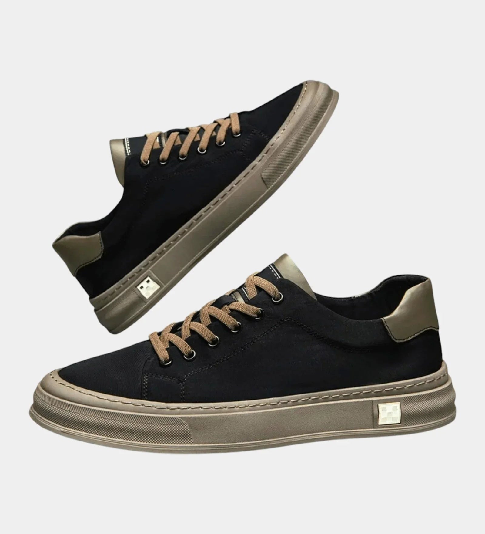 Low-top lace-up sneakers with dark upper, olive-gray rubber sole, side logo patch